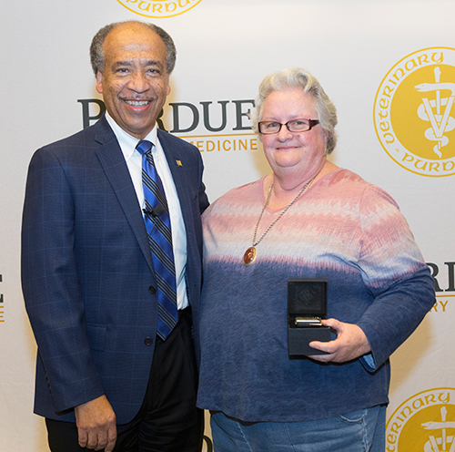 Bonita Vera (ADDL) is congratulated for 30 years of service to Purdue.