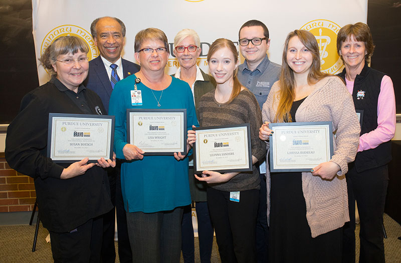 Dean Reed presented seven Bravo Awards: (left-right) Sue Boesch (VTH), Lisa Wright (VAD), Dee Dusold (ADDL), Leanna Sanders (VTH), Eric Zamora-Moran (VTH), Larissa Budreau (VTH) and Kathy Allen (BMS/VCS/IU School of Medicine).