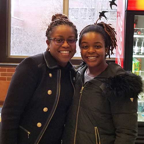 Dr. Kauline Cipriani visits with Akila Bryant, of the DVM Class of 2020, during her reception in the Continuum Cafe.